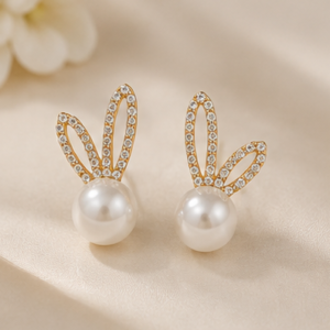 Gold tone bunny ear pearl drop earrings for women